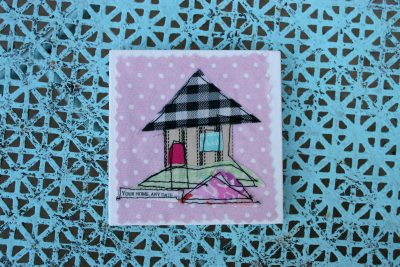 Painting with fabric; tiny fabric houses in jars.